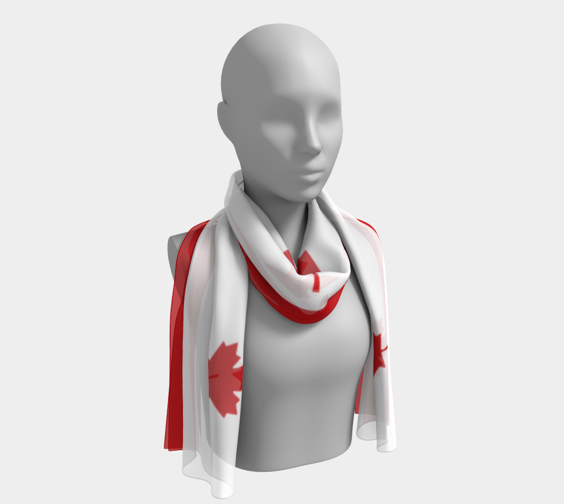 Mannequin wearing a scarf with a red maple leaf design on a white background