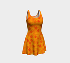 Yellow dress with red leaf pattern on a white background